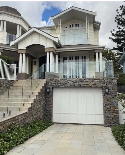 Natural stone retaining wall by All Stone & Pave