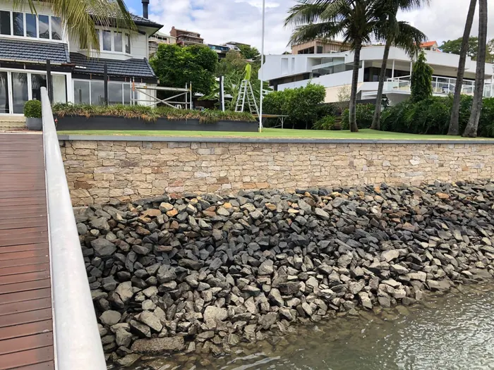 Hand-placed rock pitching by All Stone & Pave